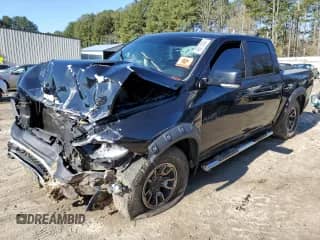 2015 Ram 1500 Rebel with VIN 1C6RR7YT7FS771791, listed as a Copart auction lot 49873094 with 119,875 mi miles and Salvage title. Bid and sale history available at DreamBid. Image 1.