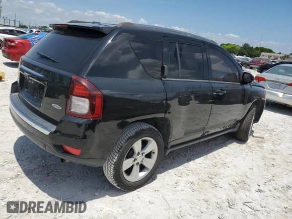 2015 Jeep Compass High Altitude with VIN 1C4NJCEA0FD178823, listed as a Copart auction lot 57904775 with 106,240 mi miles and Salvage title. Bid and sale history available at DreamBid. Image 3.