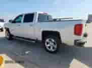 2017 Chevrolet Silverado 1500 LTZ with VIN 3GCPCSECXHG145834, listed as a Copart auction lot 65348985 with 153,460 mi miles and Salvage title. Bid and sale history available at DreamBid. Image 2.