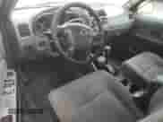 2003 Nissan Frontier XE with VIN 1N6ED29X33C464373, listed as a Copart auction lot 70272955 with 249,282 mi miles and Salvage title. Bid and sale history available at DreamBid. Image 8.