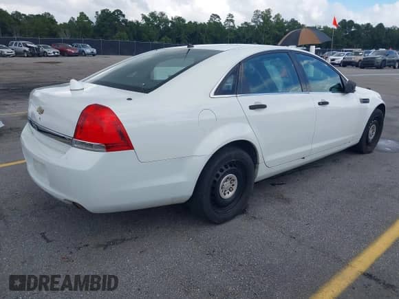 2014 Chevrolet Caprice Police Police with VIN 6G3NS5U27EL950499, listed as a IAAI auction lot 43005714 with 116,591 mi miles and . Bid and sale history available at DreamBid. Image 4.