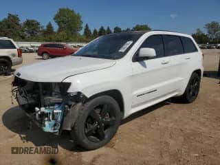 2016 Jeep Grand Cherokee High Altitude with VIN 1C4RJFCT8GC423463, listed as a Copart auction lot 70821095 with 144,093 mi miles and Salvage title. Bid and sale history available at DreamBid. Image 1.