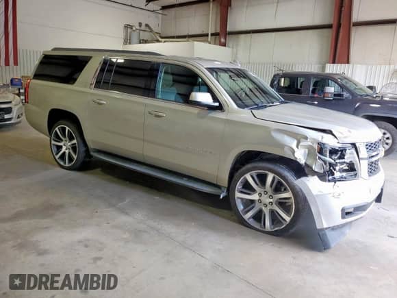 2016 Chevrolet Suburban LT с VIN 1GNSCHKC5GR170003, выставлен на аукционе Copart как лот 69984505 с пробегом 157 565 миль миль и Списание • Salvage title. История ставок и продаж доступна на DreamBid. Изображение 4.