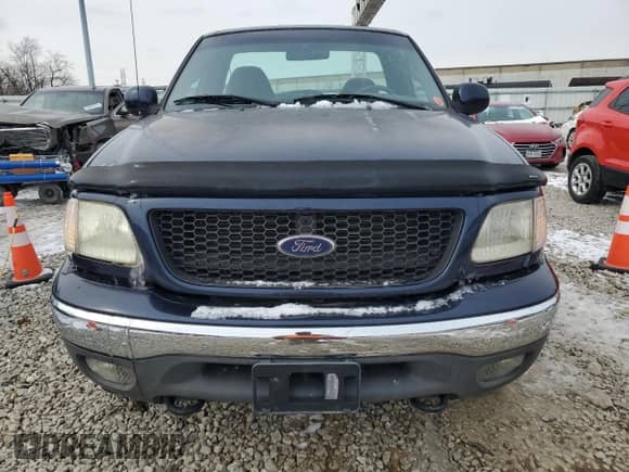 2002 Ford F-150 XL z VIN 2FTPF18L22CA42814, wystawiony jako Copart lot #45400785 z przebiegiem 53 831 mil mil oraz Szkoda całkowita • Salvage title. Historia ofert i sprzedaży dostępna na DreamBid. Obrazek 5.