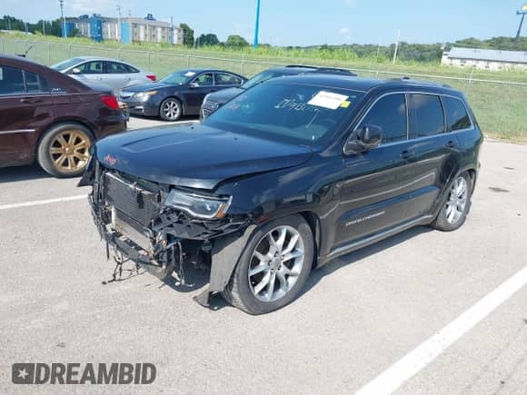 2015 Jeep Grand Cherokee Summit с VIN 1C4RJFJM4FC764997, выставлен на аукционе IAAI как лот 42966100 с пробегом Не указан миль и . История ставок и продаж доступна на DreamBid. Изображение 2.