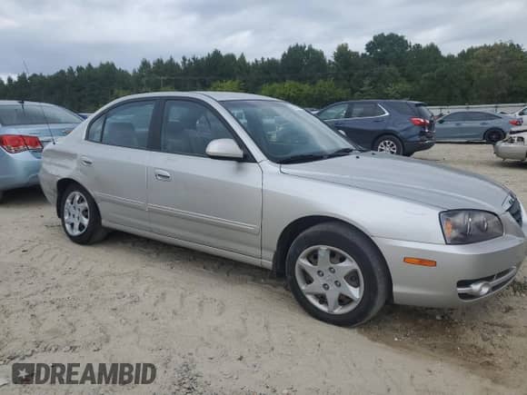 2005 Hyundai Elantra GLS z VIN KMHDN46D95U025270, wystawiony jako Copart lot #71040974 z przebiegiem 47 460 mil mil oraz Szkoda całkowita • Salvage title. Historia ofert i sprzedaży dostępna na DreamBid. Obrazek 4.