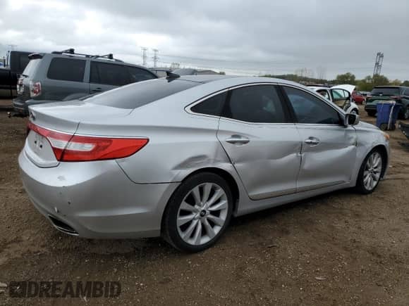 2013 Hyundai Azera с VIN KMHFH4JG6DA270769, выставлен на аукционе Copart как лот 86630765 с пробегом 133 252 миль миль и Списание • Salvage title. История ставок и продаж доступна на DreamBid. Изображение 3.