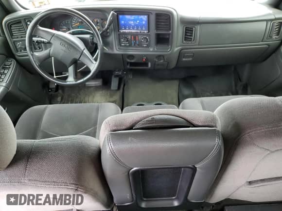 2005 GMC Sierra 1500 SLE z VIN 2GTEK13T151150626, wystawiony jako Copart lot #84979765 z przebiegiem 148 078 mil mil oraz Czysty tytuł • Clean title. Historia ofert i sprzedaży dostępna na DreamBid. Obrazek 8.