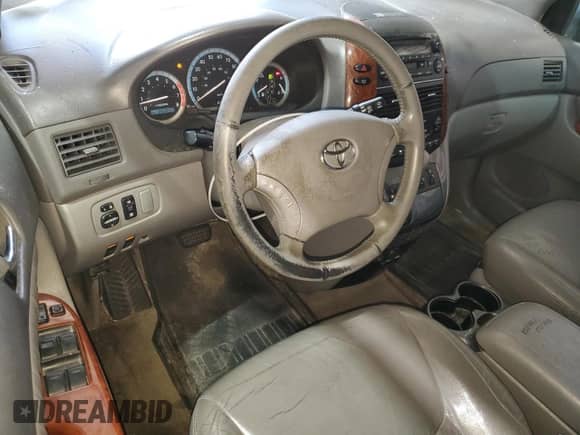 2004 Toyota Sienna XLE z VIN 5TDBA22C84S017513, wystawiony jako Copart lot #70978595 z przebiegiem 252 893 mil mil oraz Czysty tytuł • Clean title. Historia ofert i sprzedaży dostępna na DreamBid. Obrazek 8.