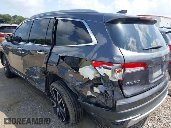 2019 Honda Pilot Touring 8-Passenger z VIN 5FNYF5H93KB010964, wystawiony jako IAAI lot #42743156 z przebiegiem 270 017 mil mil oraz . Historia ofert i sprzedaży dostępna na DreamBid. Obrazek 3.