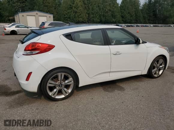 2014 Hyundai Veloster z VIN KMHTC6ADXEU187204, wystawiony jako Copart lot #71670725 z przebiegiem 94 917 mil mil oraz Czysty tytuł • Clean title. Historia ofert i sprzedaży dostępna na DreamBid. Obrazek 3.