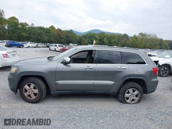 2012 Jeep Grand Cherokee Laredo with VIN 1C4RJFAG3CC272631, listed as a IAAI auction lot 43291923 with 168,220 mi miles and . Bid and sale history available at DreamBid. Image 15.