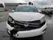 2013 Volkswagen Tiguan S z VIN WVGBV7AX0DW535519, wystawiony jako Copart lot #59439405 z przebiegiem 162 559 mil mil oraz Szkoda całkowita • Salvage title. Historia ofert i sprzedaży dostępna na DreamBid. Obrazek 5.