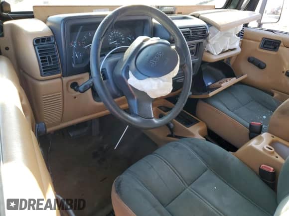 1997 Jeep Wrangler Sahara с VIN 1J4FY49S2VP542031, выставлен на аукционе Copart как лот 42509765 с пробегом 136 689 миль миль и Списание • Salvage title. История ставок и продаж доступна на DreamBid. Изображение 8.