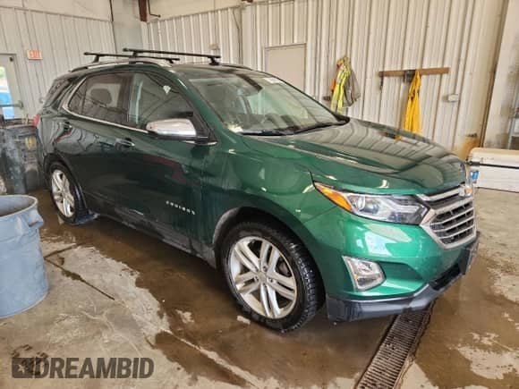 2018 Chevrolet Equinox Premier с VIN 2GNAXWEX0J6199589, выставлен на аукционе Copart как лот 70696925 с пробегом 82 249 миль миль и Чистый • Clean title. История ставок и продаж доступна на DreamBid. Изображение 4.