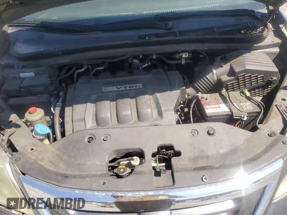 2010 Honda Odyssey LX с VIN 5FNRL3H28AB062710, выставлен на аукционе Copart как лот 71060715 с пробегом 240 460 миль миль и Списание • Salvage title. История ставок и продаж доступна на DreamBid. Изображение 12.