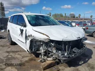 2018 Jeep Grand Cherokee Laredo E with VIN 1C4RJEAG4JC193539, listed as a IAAI auction lot 41827154 with 79,784 mi miles and . Bid and sale history available at DreamBid. Image 1.