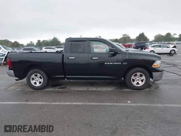 2011 Ram 1500 Big Horn z VIN 1D7RB1GT9BS555050, wystawiony jako IAAI lot #43302088 z przebiegiem 191 467 mil mil oraz . Historia ofert i sprzedaży dostępna na DreamBid. Obrazek 13.