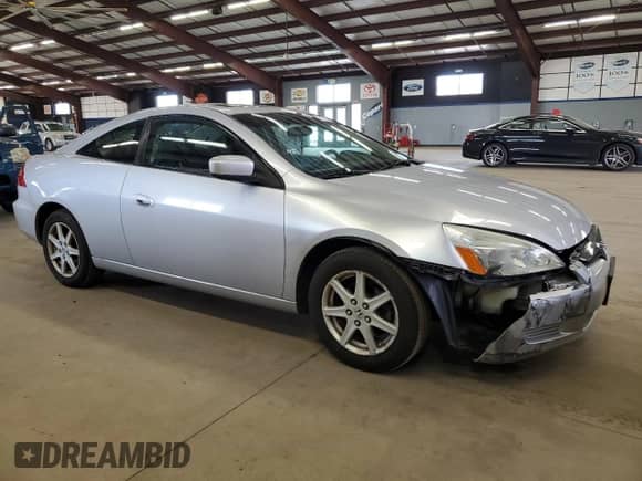 2004 Honda Accord EX-L with VIN 1HGCM82734A000781, listed as a Copart auction lot 51757825 with 117,571 mi miles and Salvage title. Bid and sale history available at DreamBid. Image 4.