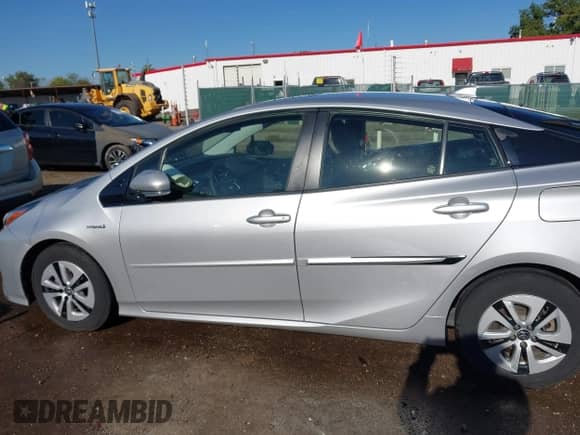 2016 Toyota Prius Three z VIN JTDKARFU1G3514243, wystawiony jako IAAI lot #43383830 z przebiegiem 113 737 mil mil oraz . Historia ofert i sprzedaży dostępna na DreamBid. Obrazek 14.