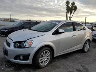2014 Chevrolet Sonic LT с VIN 1G1JC5SG1E4222171, выставлен на аукционе Copart как лот 81649595 с пробегом 101 712 миль миль и Списание • Salvage title. История ставок и продаж доступна на DreamBid. Изображение 1.