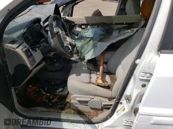 2005 Chevrolet Equinox LS z VIN 2CNDL23FX56076212, wystawiony jako Copart lot #65089674 z przebiegiem Nie podano mil oraz Szkoda całkowita • Salvage title. Historia ofert i sprzedaży dostępna na DreamBid. Obrazek 7.