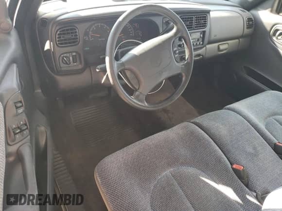 1999 Dodge Dakota SLT with VIN 1B7GL22XXXS206033, listed as a Copart auction lot 85650995 with 111,977 mi miles and Salvage title. Bid and sale history available at DreamBid. Image 8.