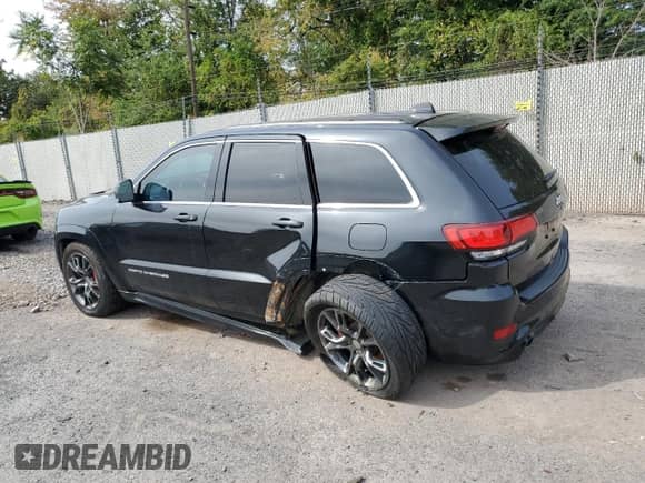 2015 Jeep Grand Cherokee SRT с VIN 1C4RJFDJ1FC787946, выставлен на аукционе Copart как лот 80877805 с пробегом 77 753 миль миль и Списание • Salvage title. История ставок и продаж доступна на DreamBid. Изображение 2.