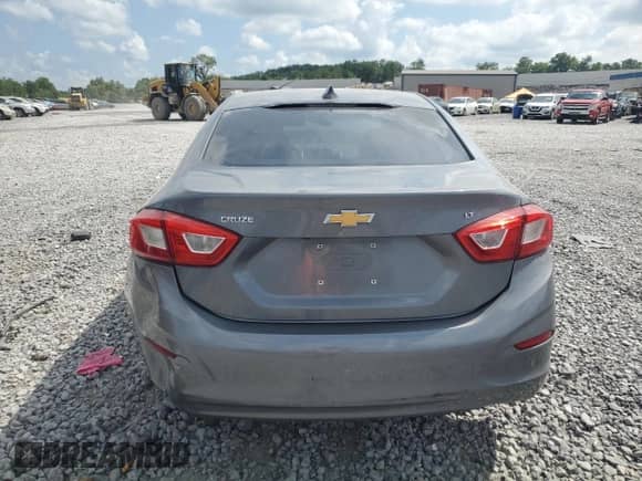 2018 Chevrolet Cruze LT с VIN 1G1BE5SM0J7154443, выставлен на аукционе Copart как лот 63245905 с пробегом 149 661 миль миль и Списание • Salvage title. История ставок и продаж доступна на DreamBid. Изображение 6.
