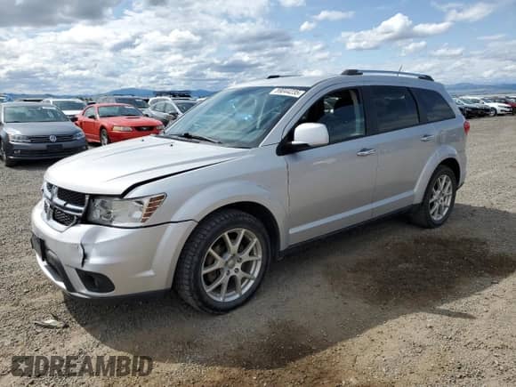 2013 Dodge Journey R/T with VIN 3C4PDDFG4DT631373, listed as a Copart auction lot 59044235 with 163,078 mi miles and Salvage title. Bid and sale history available at DreamBid. Image 1.