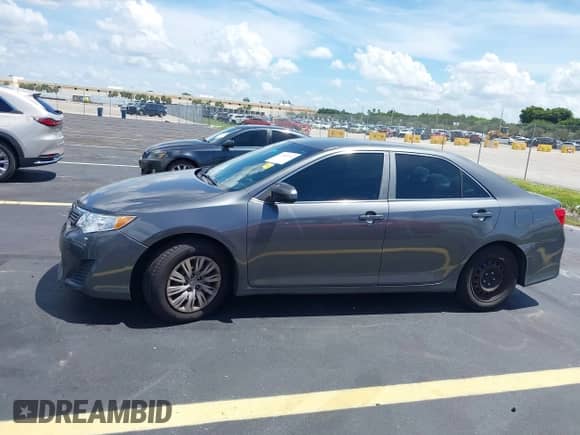 2012 Toyota Camry L z VIN 4T1BF1FK5CU629140, wystawiony jako IAAI lot #42885614 z przebiegiem 94 732 mil mil oraz . Historia ofert i sprzedaży dostępna na DreamBid. Obrazek 14.