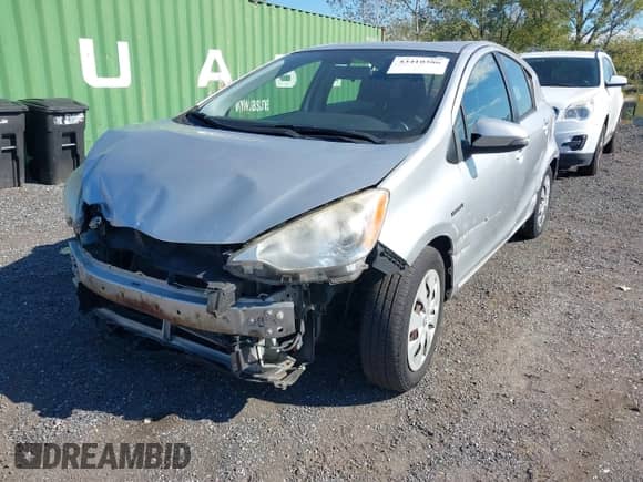 2013 Toyota Prius One with VIN JTDKDTB35D1040175, listed as a IAAI auction lot 43410386 with 178,590 mi miles and . Bid and sale history available at DreamBid. Image 6.