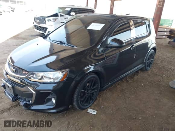 2018 Chevrolet Sonic Premier z VIN 1G1JF6SB1J4127282, wystawiony jako IAAI lot #42740961 z przebiegiem 84 338 mil mil oraz . Historia ofert i sprzedaży dostępna na DreamBid. Obrazek 2.