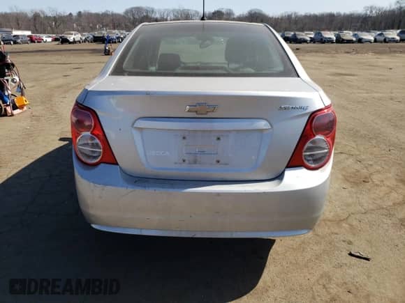 2012 Chevrolet Sonic LS с VIN 1G1JB5SH8C4112274, выставлен на аукционе Copart как лот 48847175 с пробегом Не указан миль и Списание • Salvage title. История ставок и продаж доступна на DreamBid. Изображение 6.