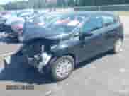 2016 Ford Fiesta S z VIN 3FADP4TJ6GM141872, wystawiony jako IAAI lot #43140520 z przebiegiem 169 678 mil mil oraz . Historia ofert i sprzedaży dostępna na DreamBid. Obrazek 18.