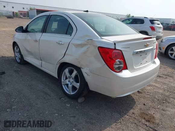 2013 Chevrolet Sonic LTZ with VIN 1G1JE5SB5D4195389, listed as a IAAI auction lot 42400418 with 27,607 mi miles and . Bid and sale history available at DreamBid. Image 3.