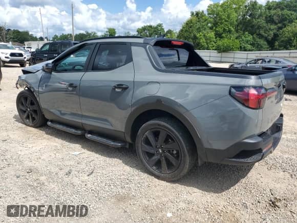 2023 Hyundai Santa Cruz Night Edition с VIN 5NTJCDAF6PH055816, выставлен на аукционе Copart как лот 59522905 с пробегом Не указан миль и На запчасти • Non repairable. История ставок и продаж доступна на DreamBid. Изображение 2.