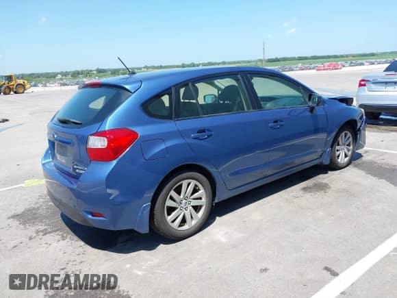 2015 Subaru Impreza Premium with VIN JF1GPAC6XFH283135, listed as a IAAI auction lot 42657293 with 73,176 mi miles and . Bid and sale history available at DreamBid. Image 4.