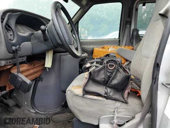 1999 Ford Econoline Cargo with VIN 1FMNE31S7XHB44466, listed as a Copart auction lot 58904415 with Not provided miles and Salvage title. Bid and sale history available at DreamBid. Image 7.