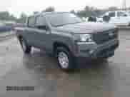 2022 Nissan Frontier S z VIN 1N6ED1EK4NN690661, wystawiony jako IAAI lot #42497086 z przebiegiem 27 414 mil mil oraz . Historia ofert i sprzedaży dostępna na DreamBid. Obrazek 1.