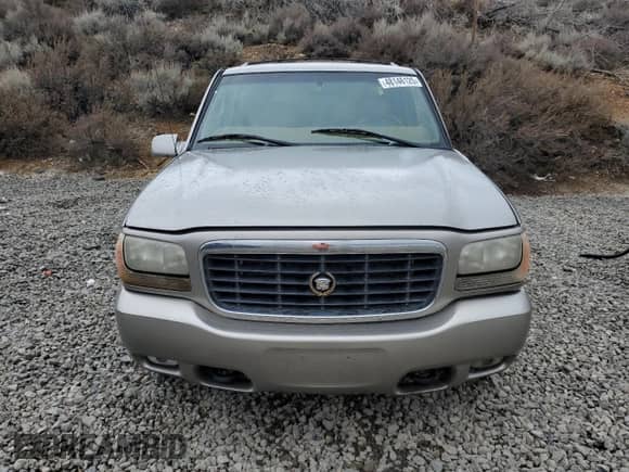 2000 Cadillac Escalade z VIN 1GYEK13RXYR103671, wystawiony jako Copart lot #48146125 z przebiegiem 271 195 mil mil oraz Szkoda całkowita • Salvage title. Historia ofert i sprzedaży dostępna na DreamBid. Obrazek 5.