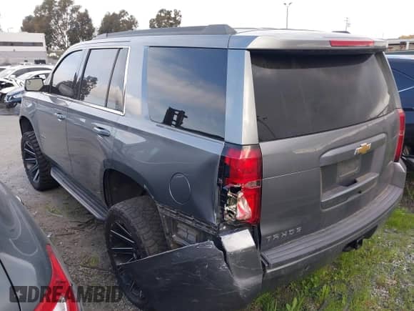 2019 Chevrolet Tahoe LS with VIN 1GNSCAEC9KR181095, listed as a IAAI auction lot 41626690 with 83,208 mi miles and . Bid and sale history available at DreamBid. Image 3.