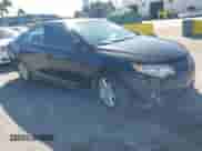 2014 Toyota Camry L z VIN 4T1BF1FK6EU330209, wystawiony jako IAAI lot #43584677 z przebiegiem 79 370 mil mil oraz . Historia ofert i sprzedaży dostępna na DreamBid. Obrazek 1.