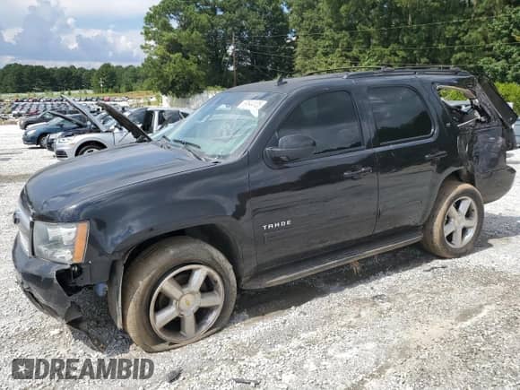 2013 Chevrolet Tahoe LT с VIN 1GNSKBE01DR267244, выставлен на аукционе Copart как лот 69544125 с пробегом 193 184 миль миль и Списание • Salvage title. История ставок и продаж доступна на DreamBid. Изображение 1.