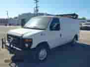 2014 Ford Econoline Cargo Commercial with VIN 1FTNE1EL7EDA59384, listed as a IAAI auction lot 43391909 with 306,342 mi miles and . Bid and sale history available at DreamBid. Image 2.