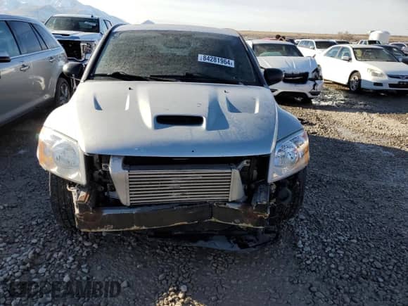 2008 Dodge Caliber с VIN 1B3HB68FX8D664451, выставлен на аукционе Copart как лот 84281964 с пробегом 118 320 миль миль и Списание • Salvage title. История ставок и продаж доступна на DreamBid. Изображение 5.