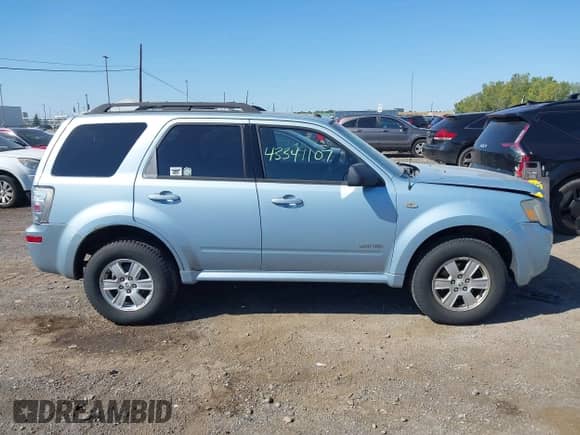 2008 Mercury Mariner with VIN 4M2CU91198KJ24730, listed as a IAAI auction lot 43341107 with 158,521 mi miles and . Bid and sale history available at DreamBid. Image 13.