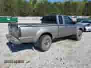 2004 Nissan Frontier XE Desert Runner with VIN 1N6ED26Y24C429693, listed as a Copart auction lot 52411095 with 216,430 mi miles and Salvage title. Bid and sale history available at DreamBid. Image 3.