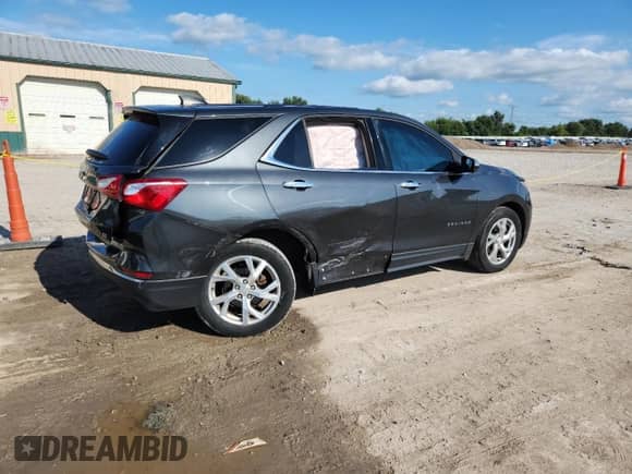 2018 Chevrolet Equinox LT с VIN 2GNAXKEX9J6229911, выставлен на аукционе Copart как лот 69728105 с пробегом 84 149 миль миль и Списание • Salvage title. История ставок и продаж доступна на DreamBid. Изображение 3.