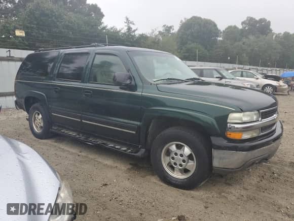 2002 Chevrolet Suburban LT z VIN 1GNFK16Z22J130446, wystawiony jako Copart lot #70923804 z przebiegiem 316 258 mil mil oraz Czysty tytuł • Clean title. Historia ofert i sprzedaży dostępna na DreamBid. Obrazek 4.